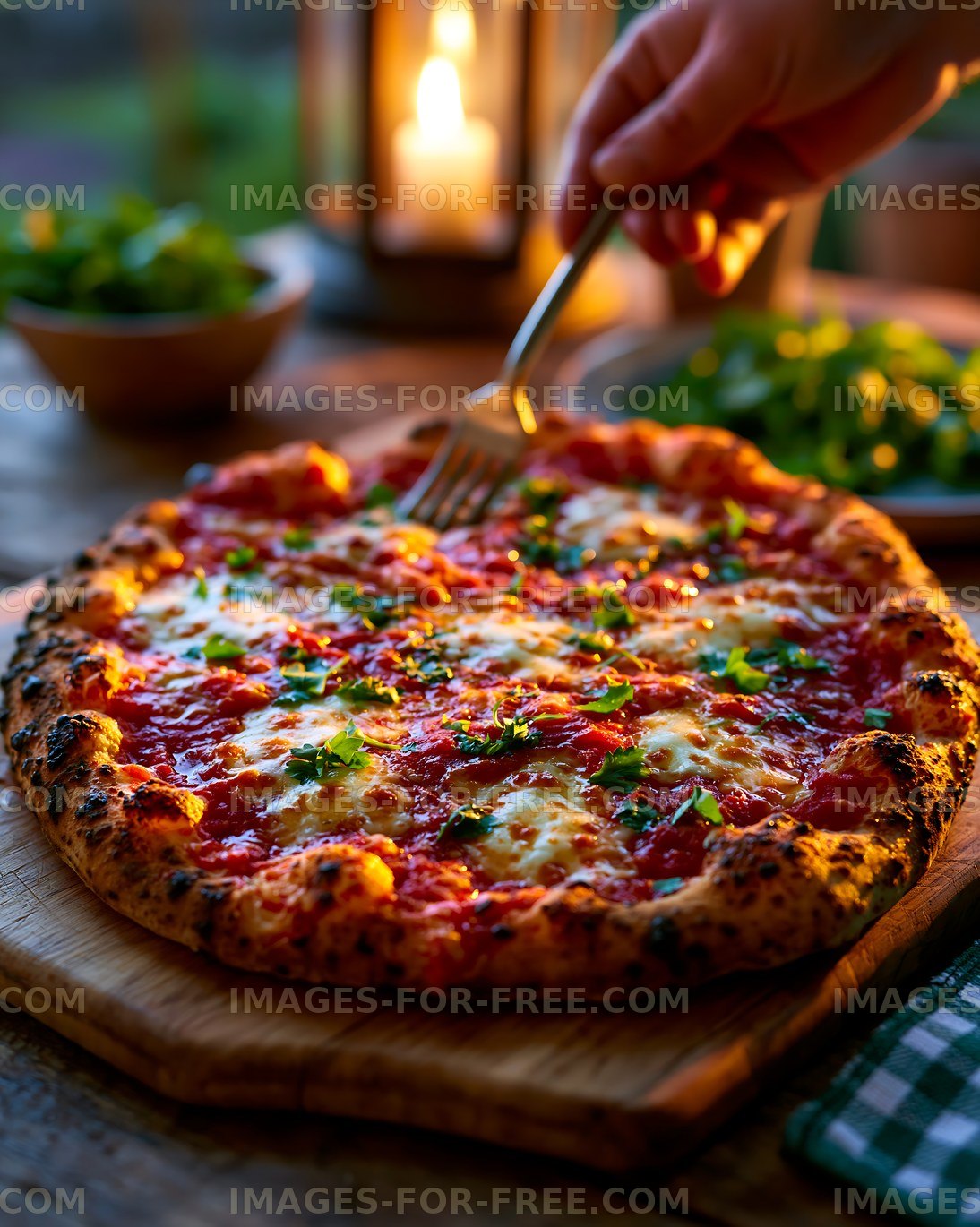 Freshly baked pizza on a wooden board with fresh herbs