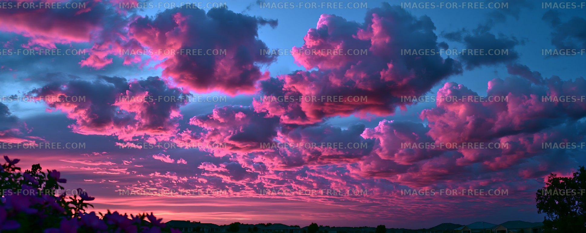 Colorful clouds above a landscape during sunset