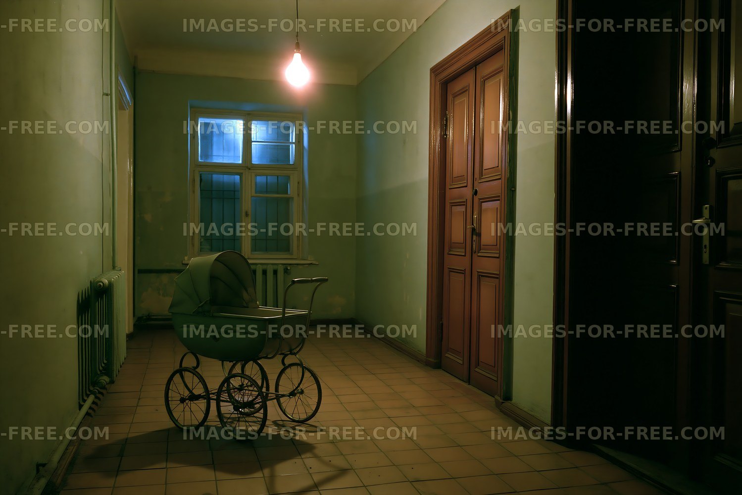 Empty hallway with a baby stroller in dim light