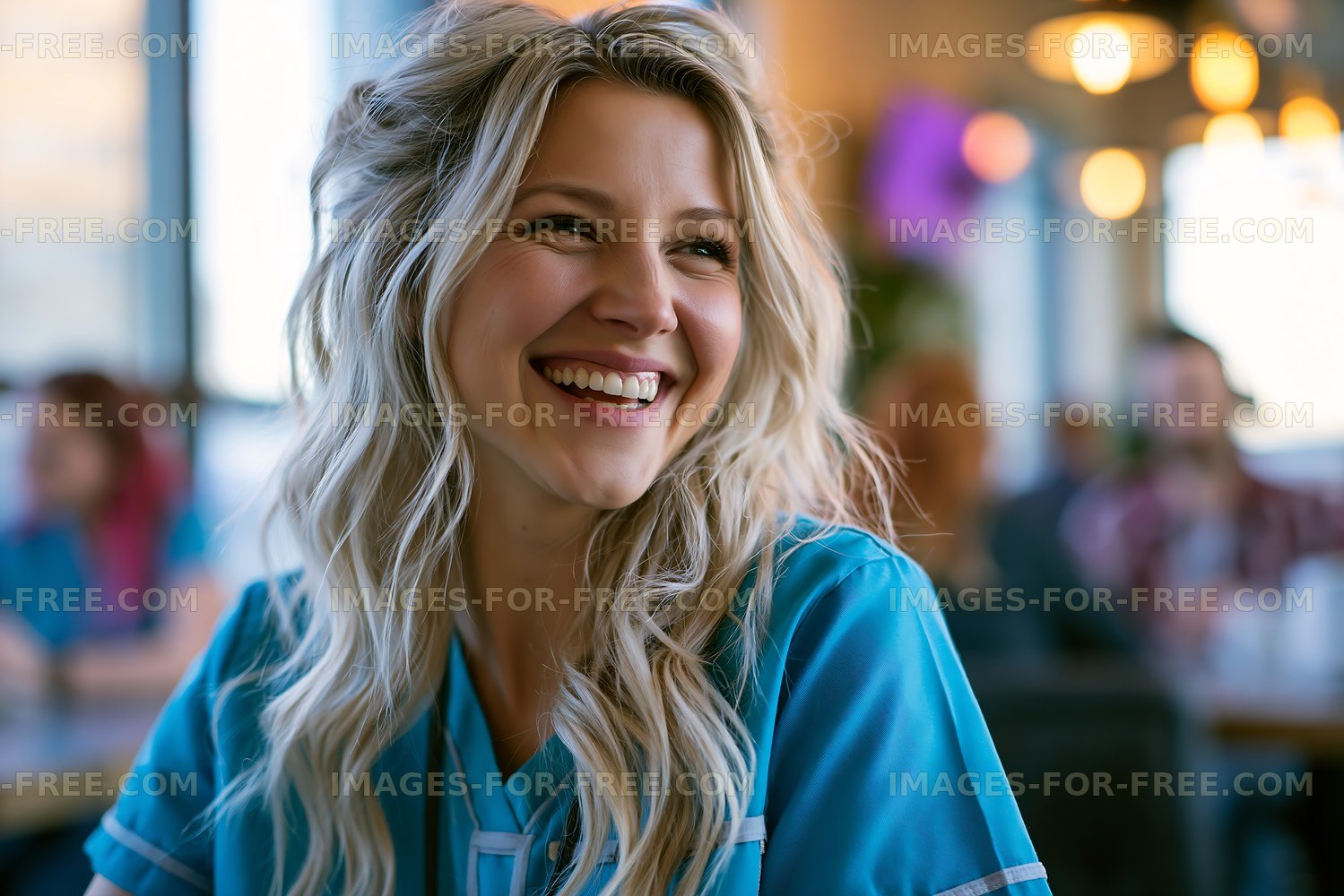 Woman smiling in a cafe with people in the background