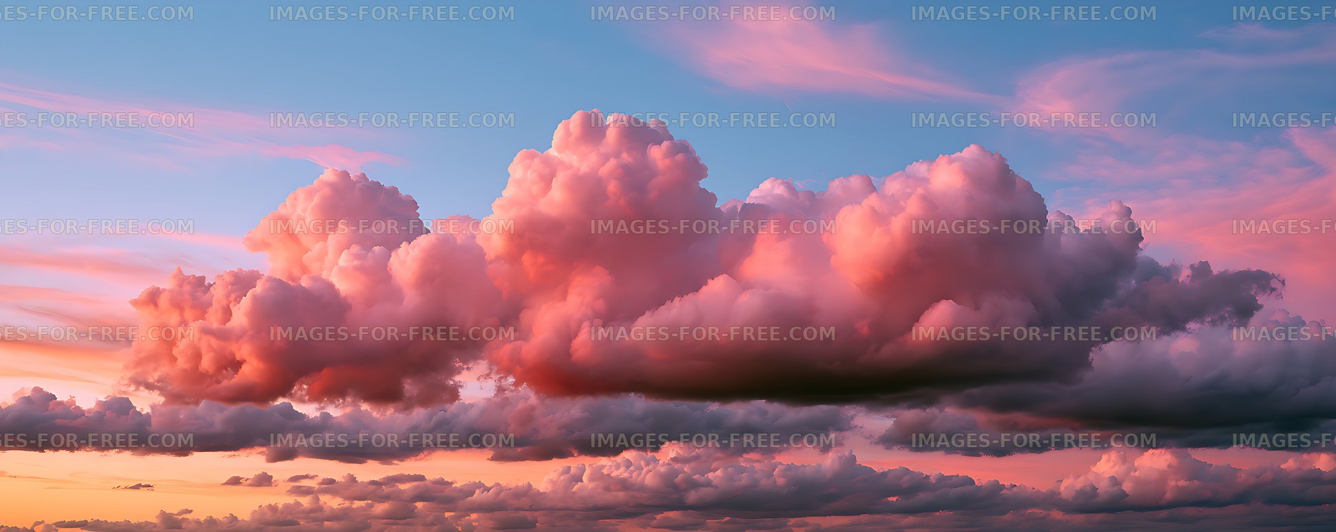 Clouds at sunset with shades of pink and blue in the sky