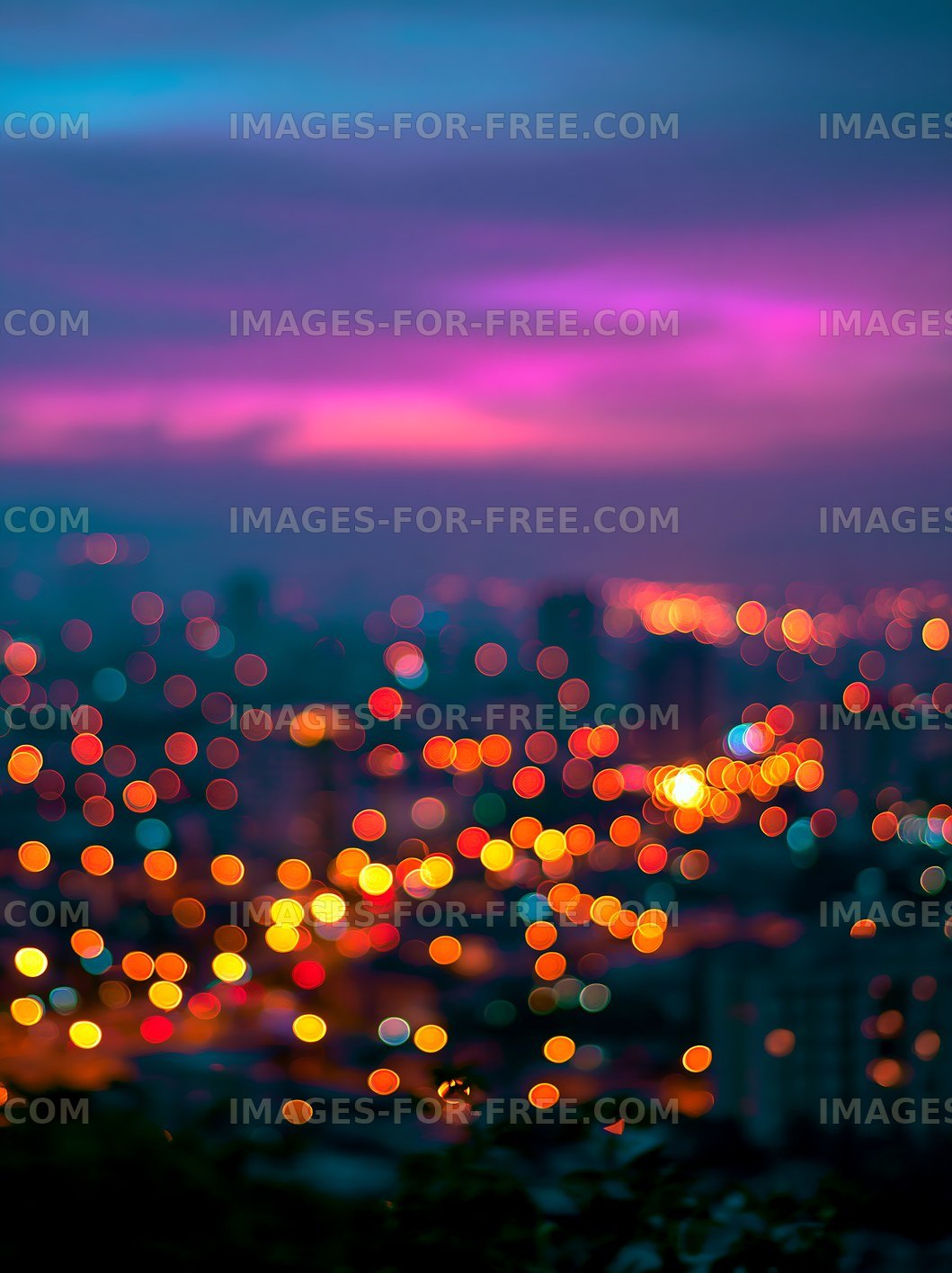 City lights at dusk create a colorful scene in the background