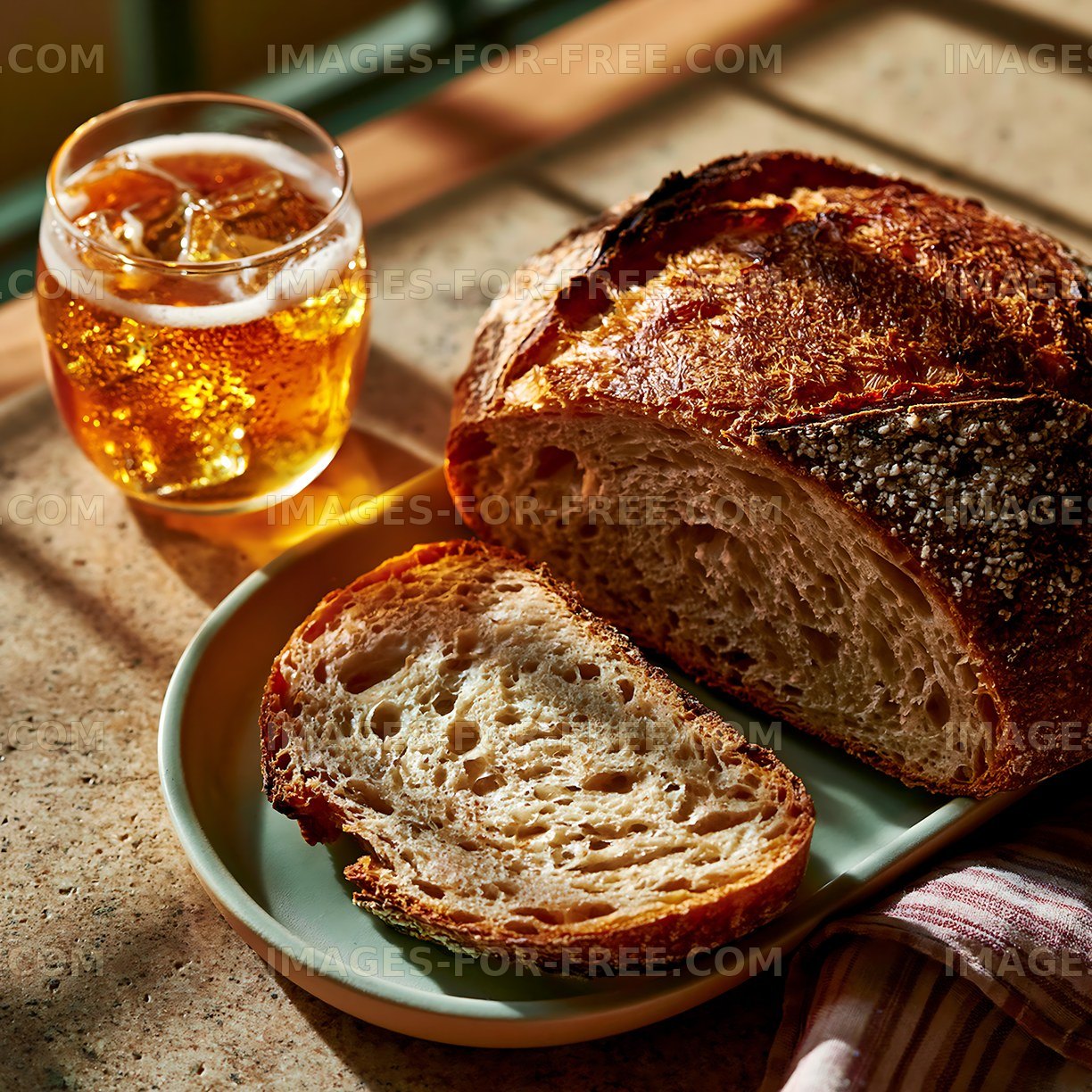 Fresh bread and iced drink on a wooden table