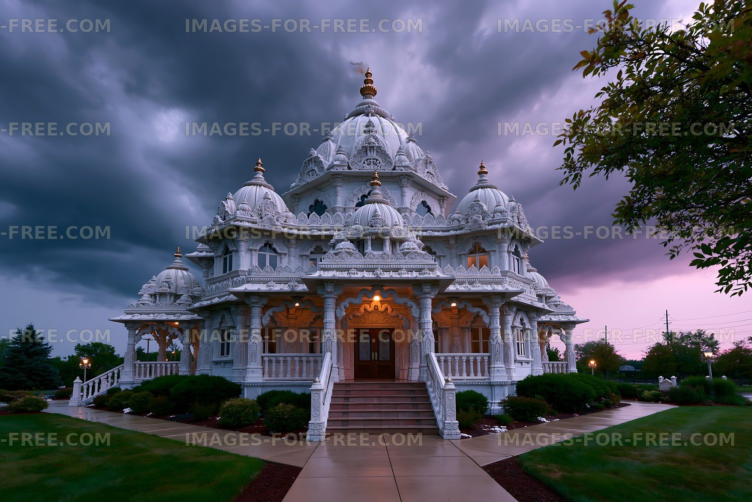 Cloudy sky over a white temple structure with detailed carvings