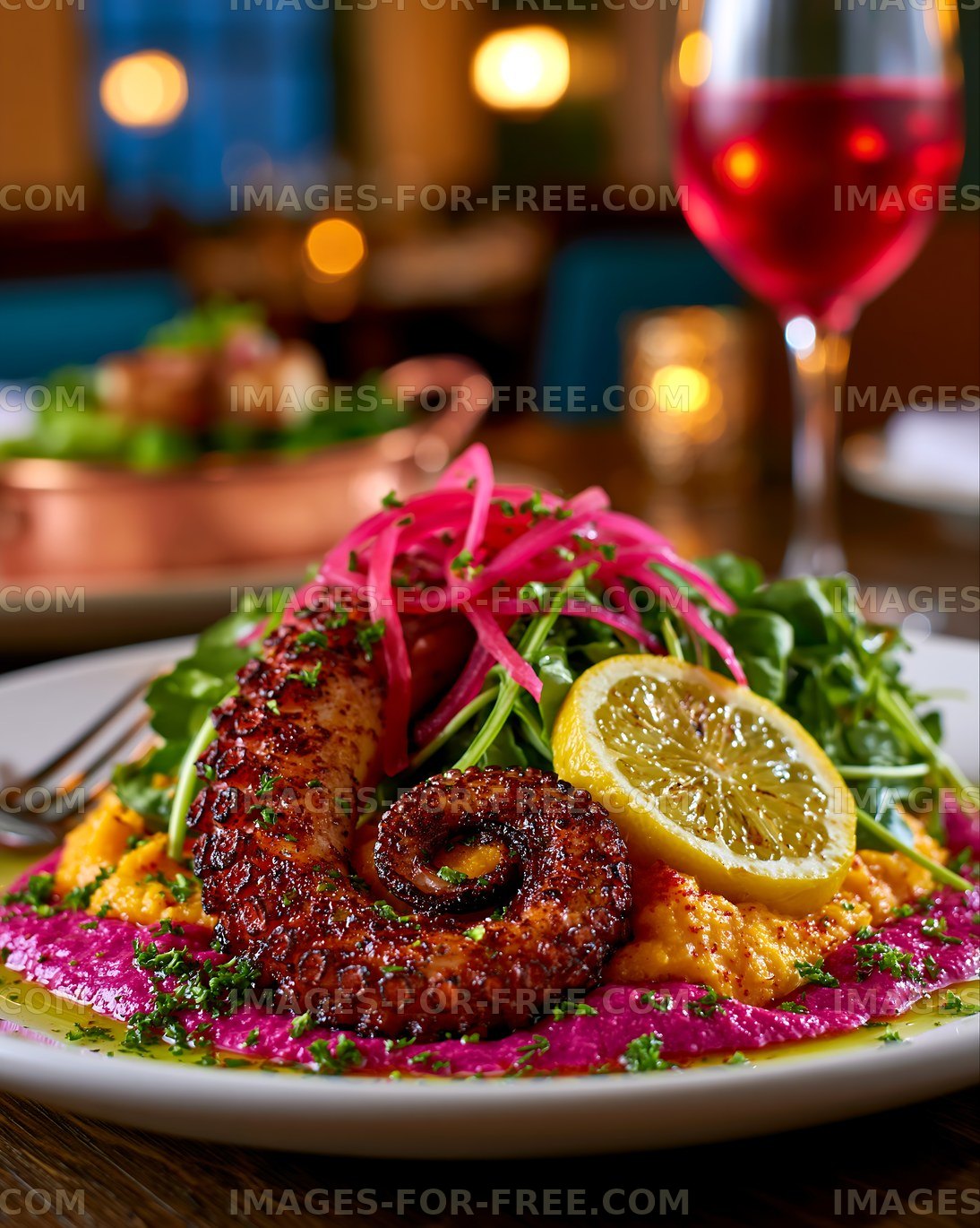 Grilled octopus served with vibrant sides and fresh greens