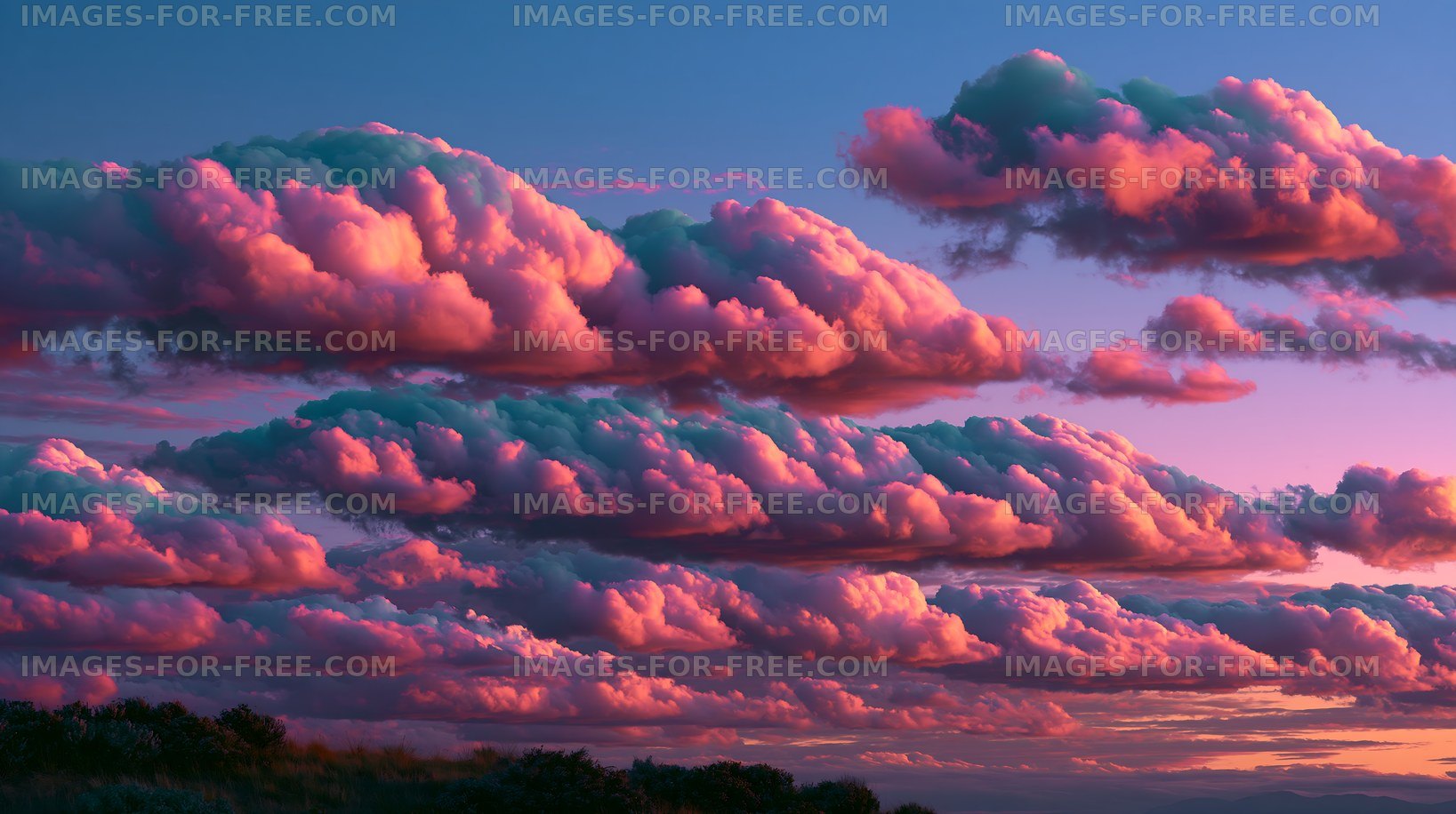 Colorful clouds in the sky during sunset over open land