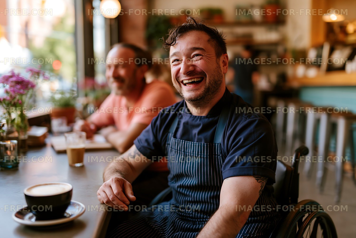 Barista in wheelchair smiles while serving coffee in cafe