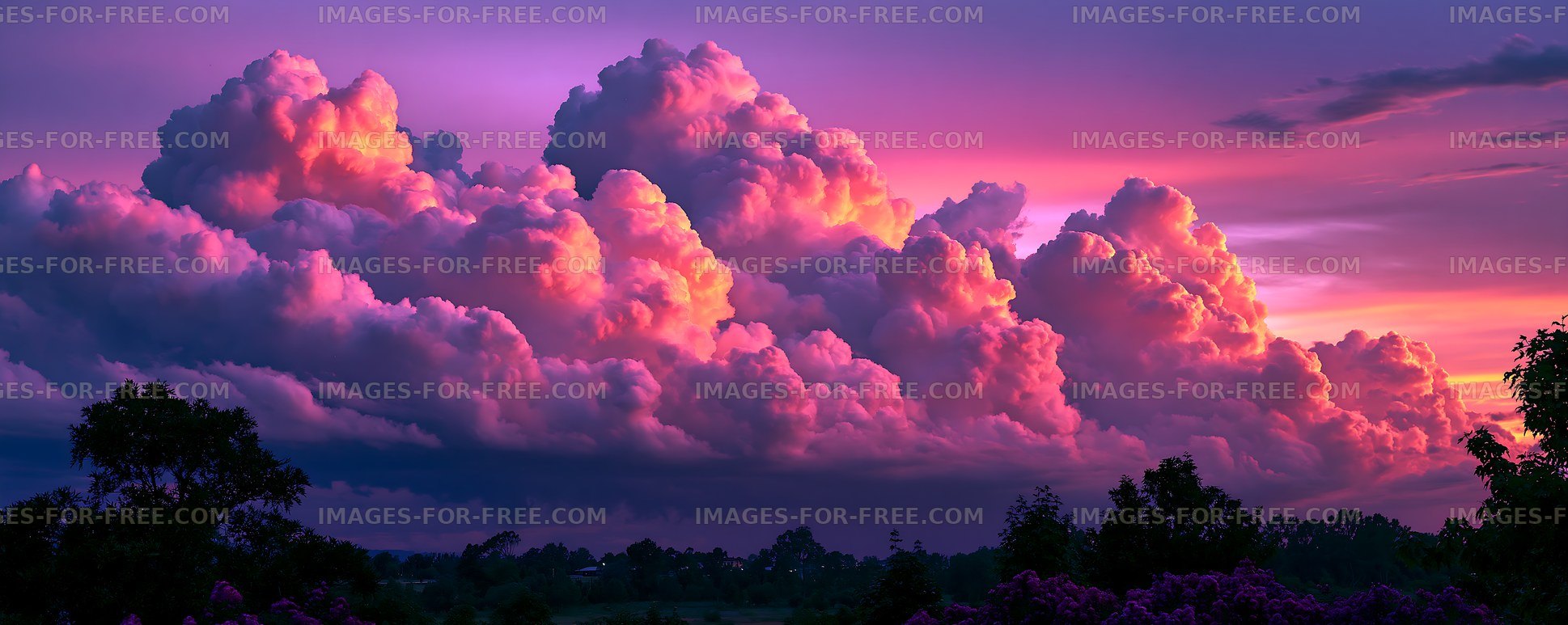 Colorful clouds at sunset over a landscape