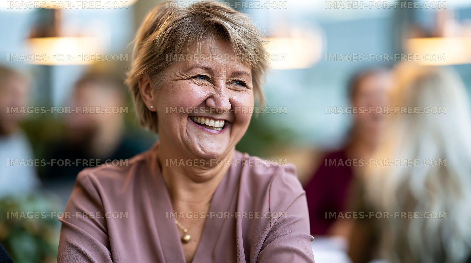 Joyful mature woman smiling indoors