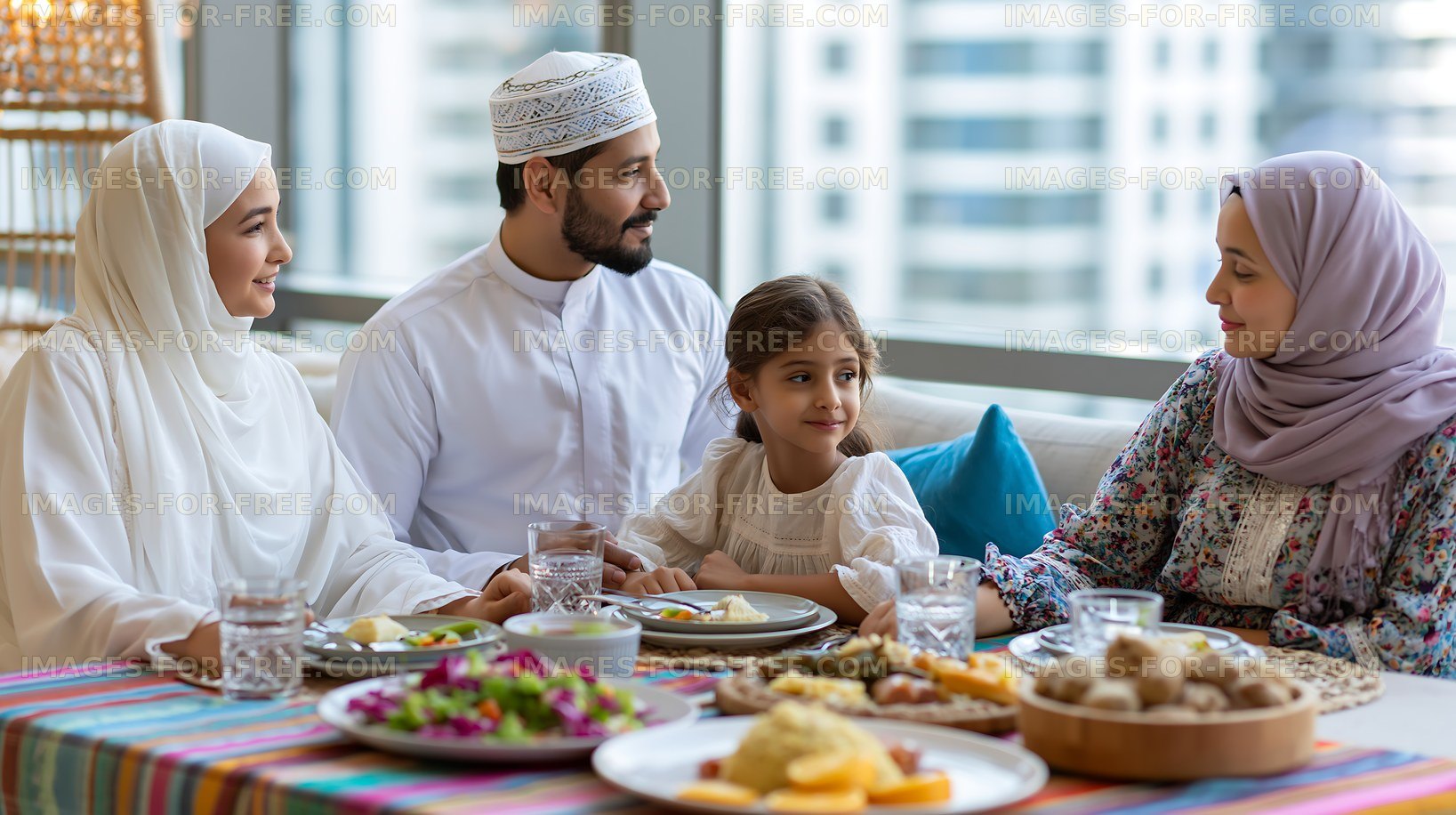Family gathering around a dining table with Middle Eastern dishes