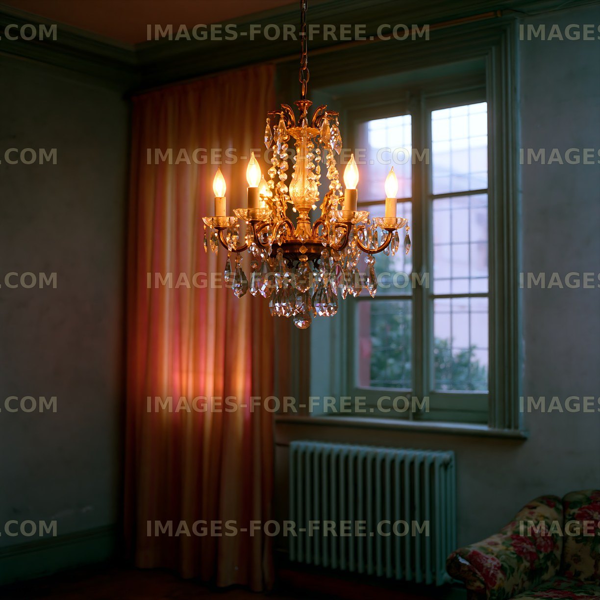 Ornate illuminated chandelier in an atmospheric interior