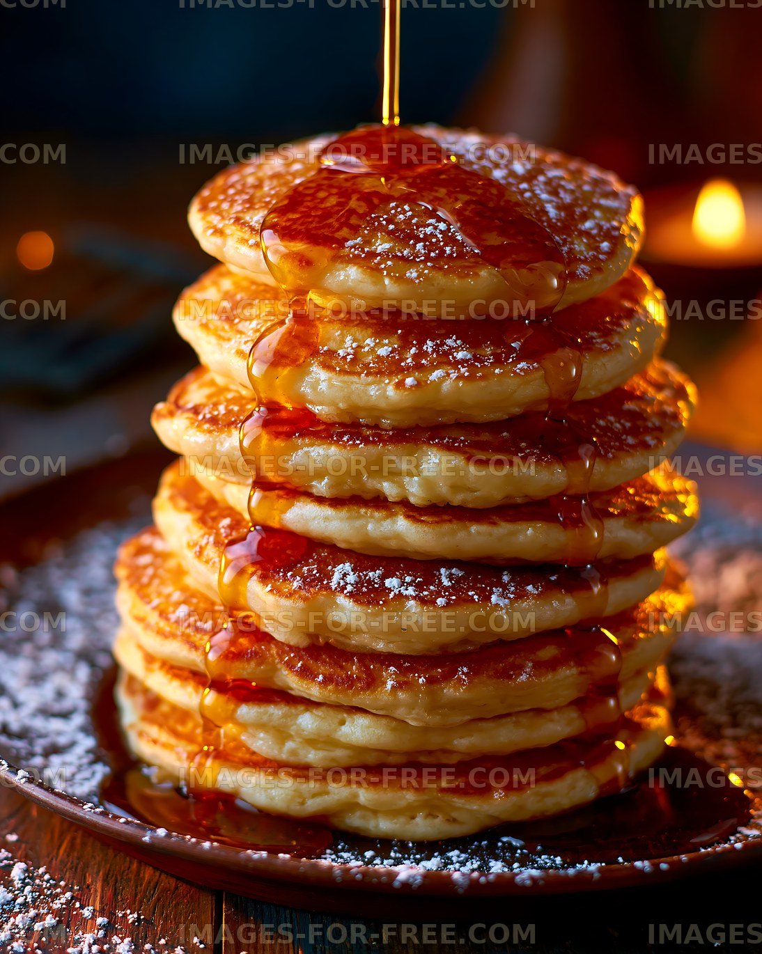 Golden pancake stack drizzled with syrup