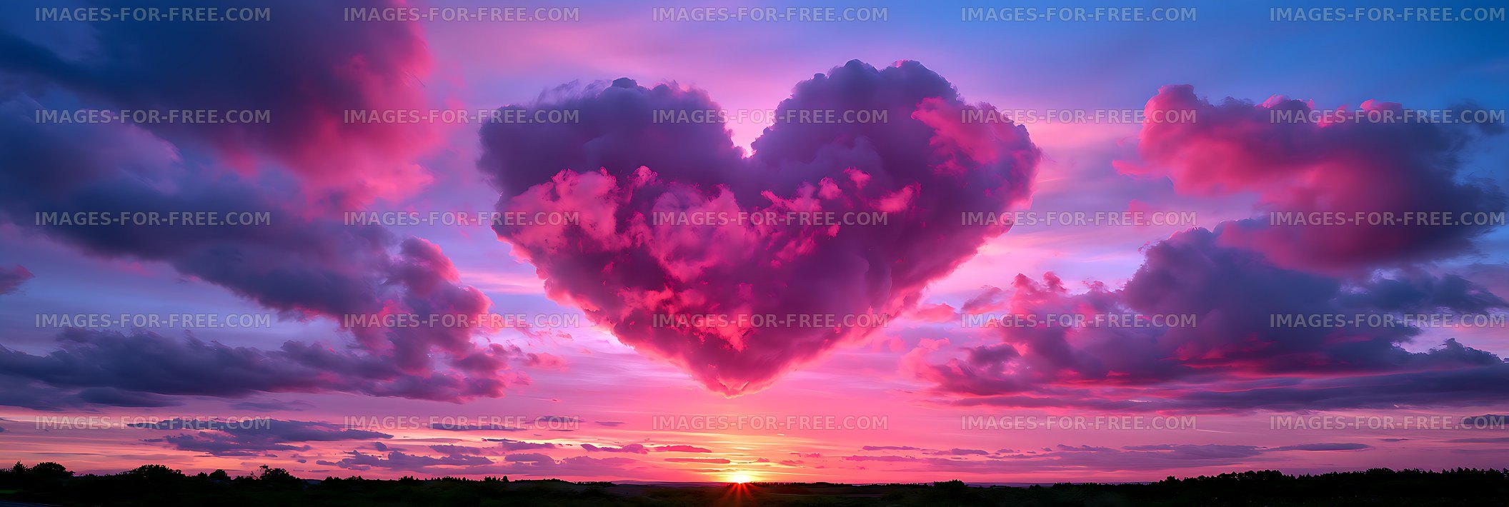 Clouds form heart shape in the sky during sunset