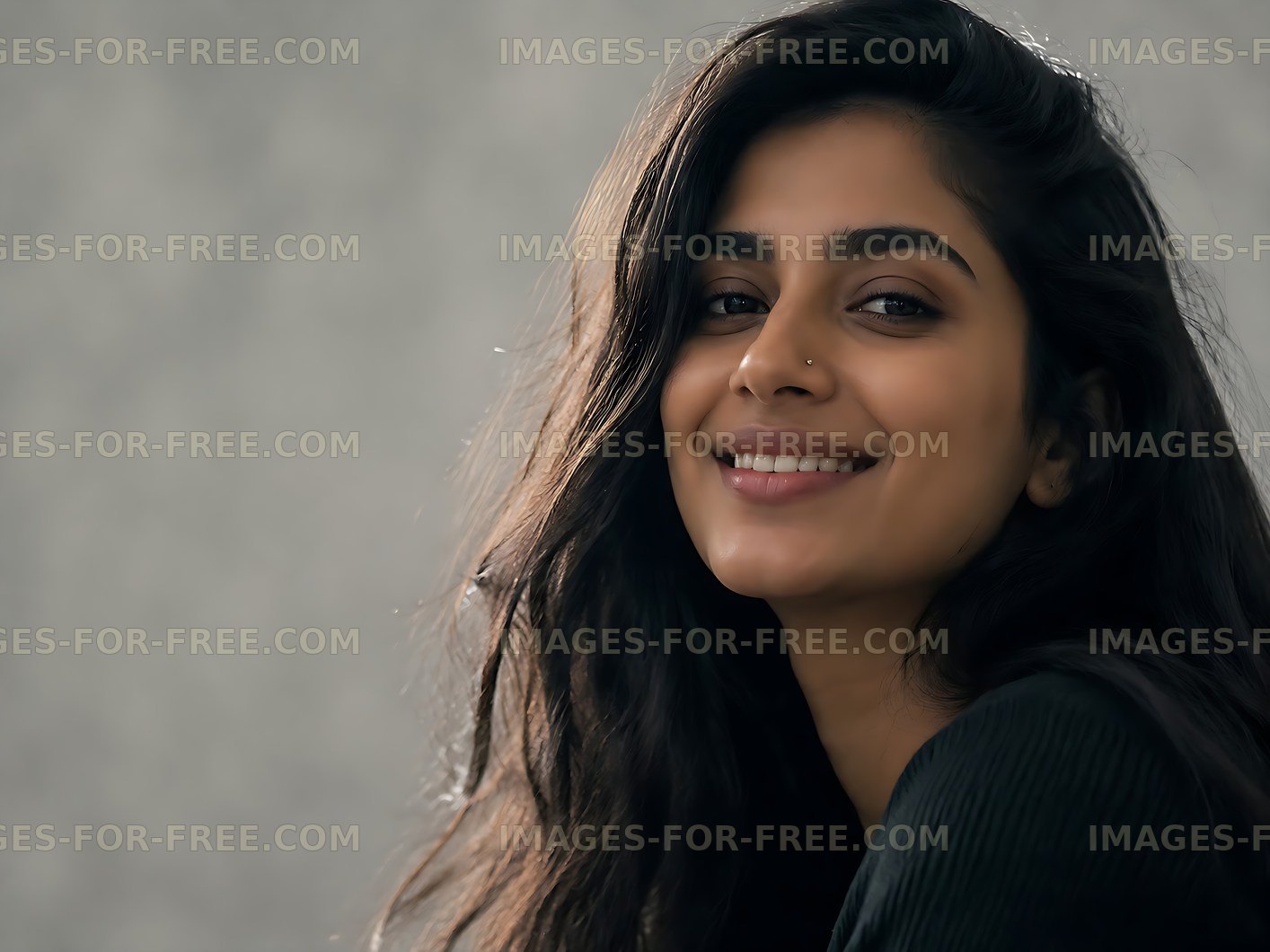 Smiling woman with long hair in casual setting