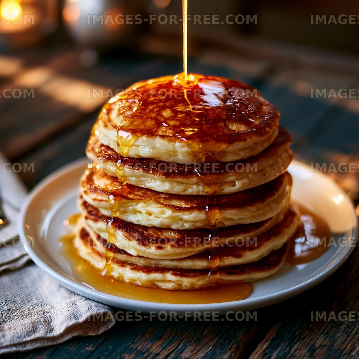 Pancake stack with flowing maple syrup