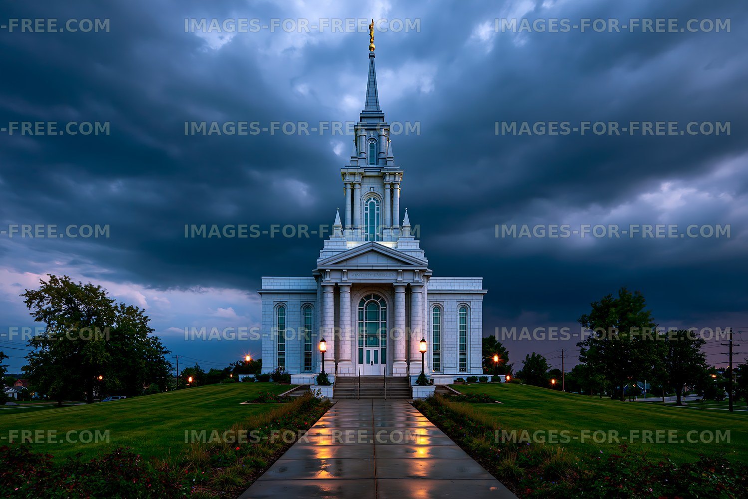 Illuminated white temple after rain under stormy skies