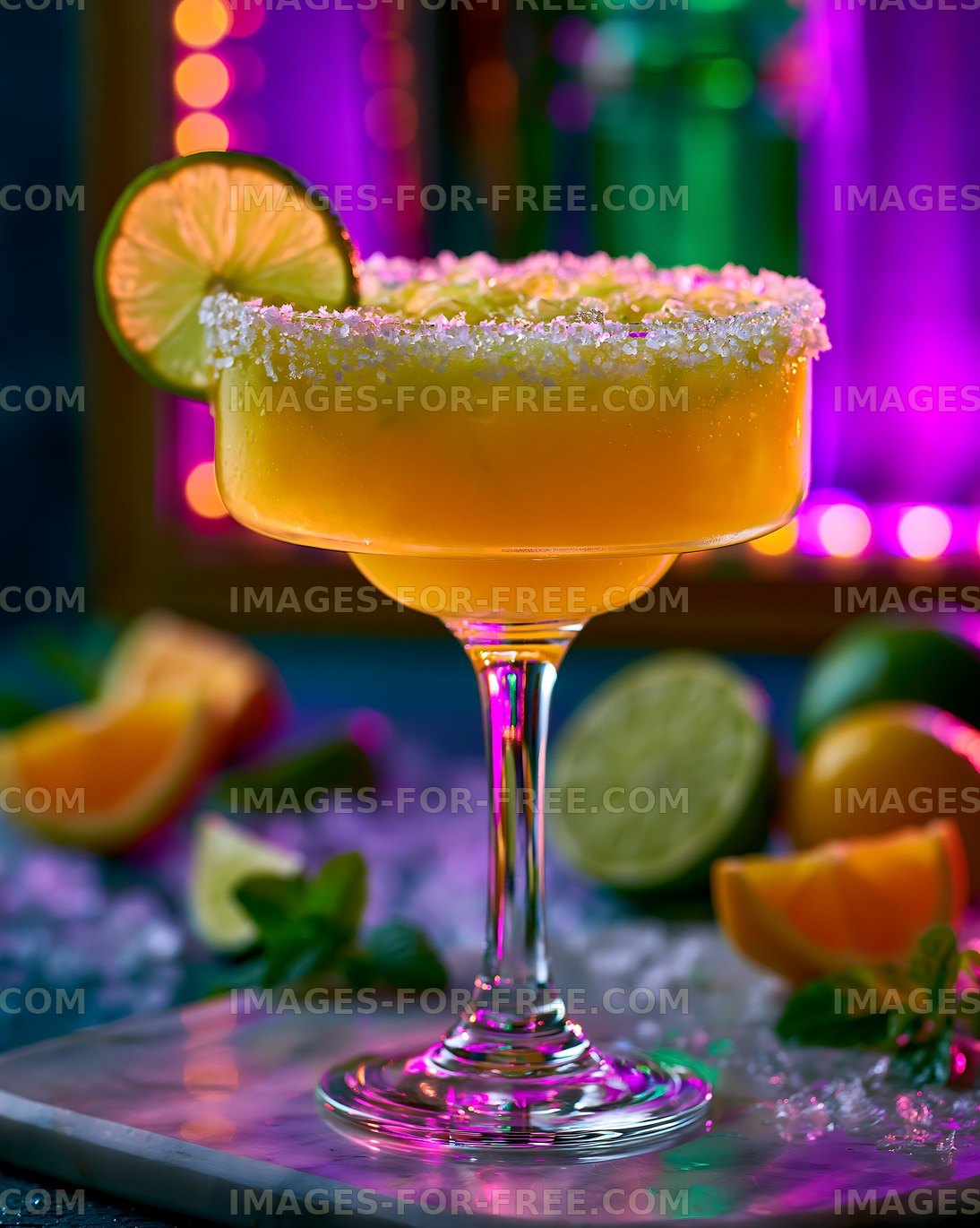 Salt-rimmed citrus cocktail with lime and vibrant bokeh