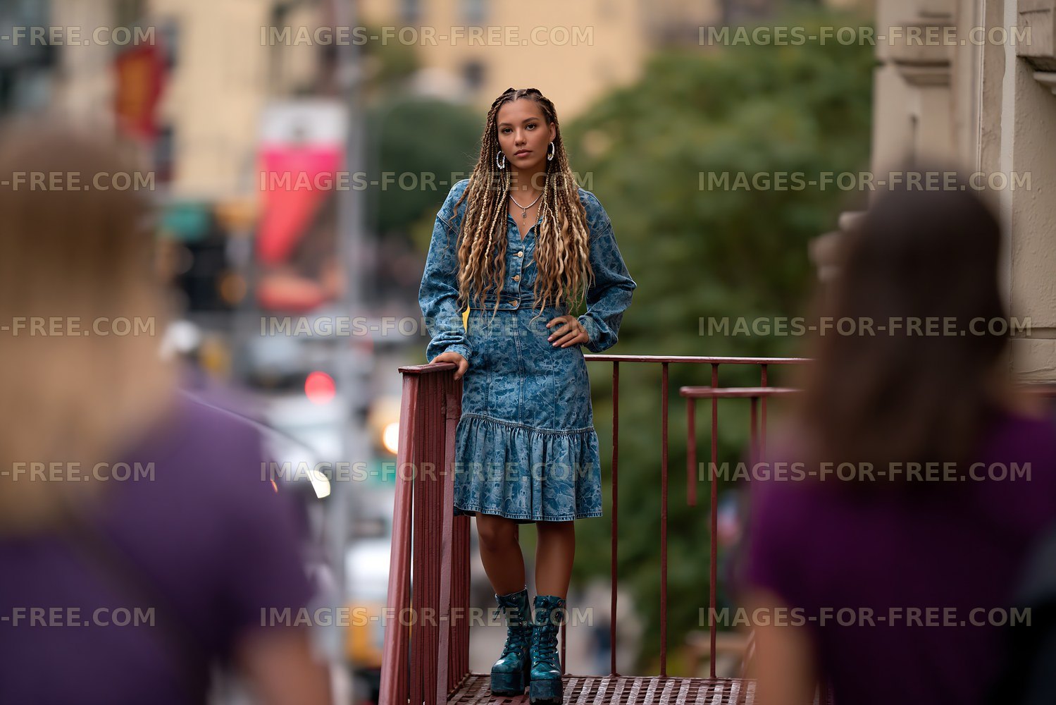 Fashion portrait of woman on a city footbridge