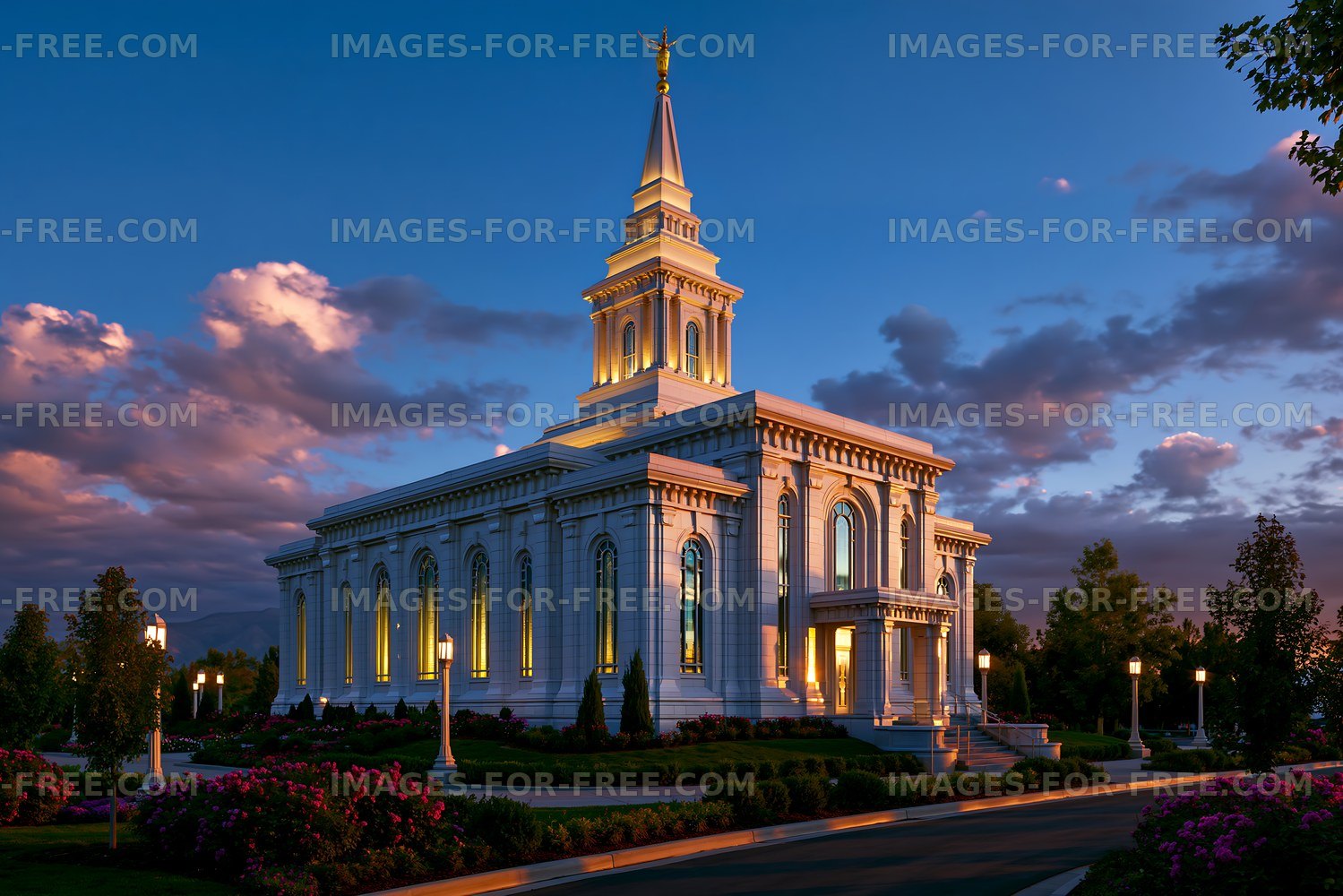 White temple glowing beneath a colorful twilight sky