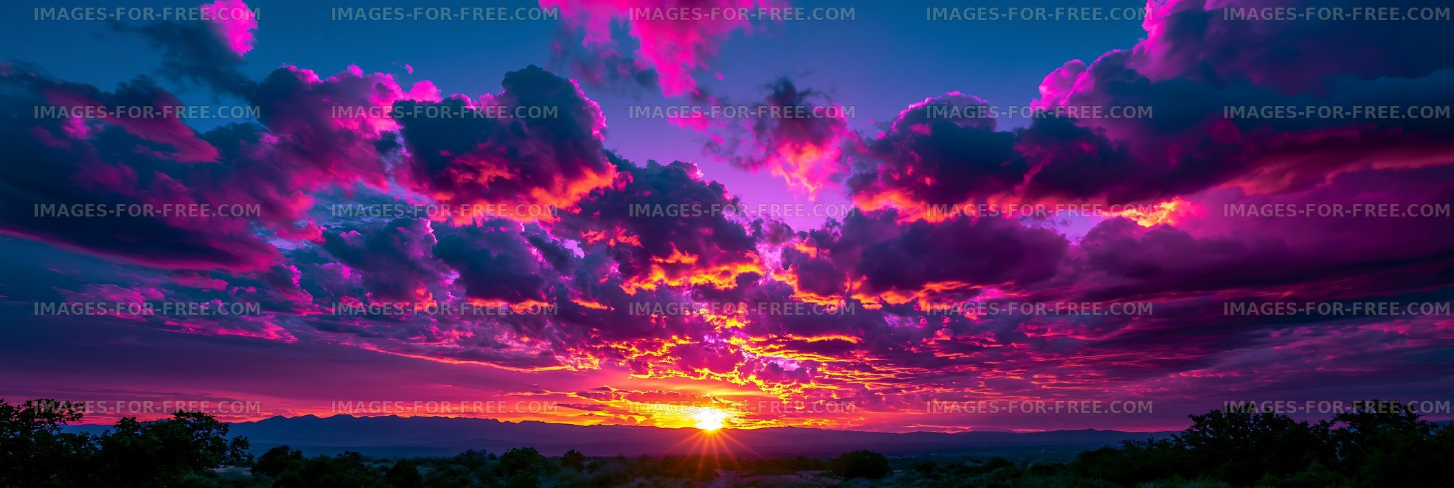 Colorful mountain sunset with dramatic cloud formations