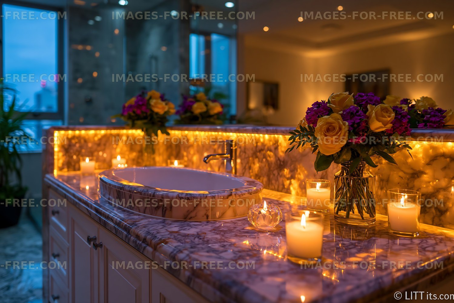 Candlelit marble bathroom with bathtub and flowers