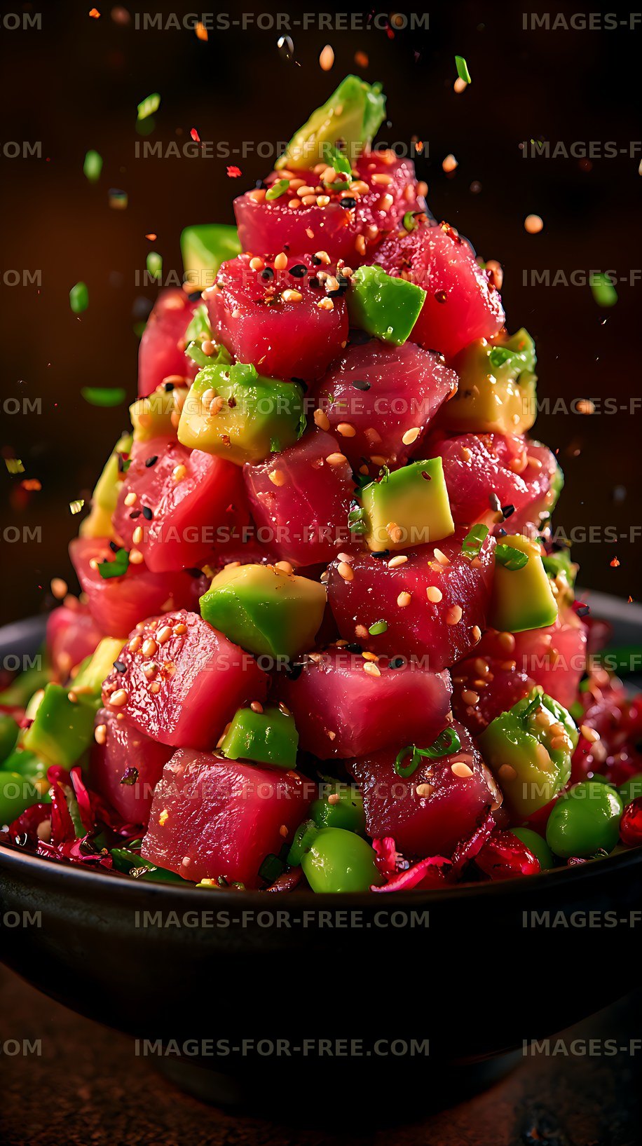 Vibrant dragon fruit avocado salad in a dark bowl