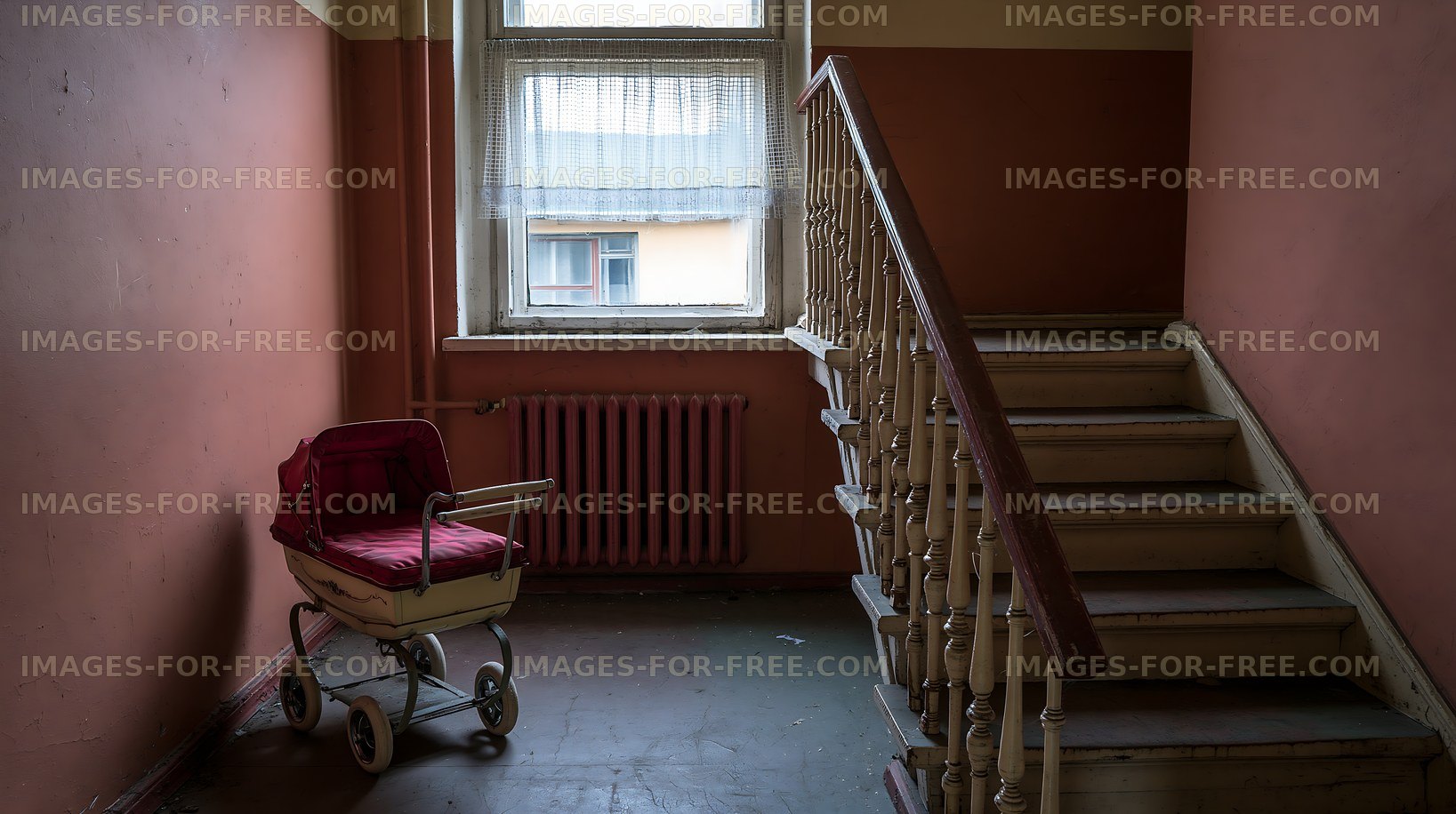 Empty vintage pram in a weathered stairwell