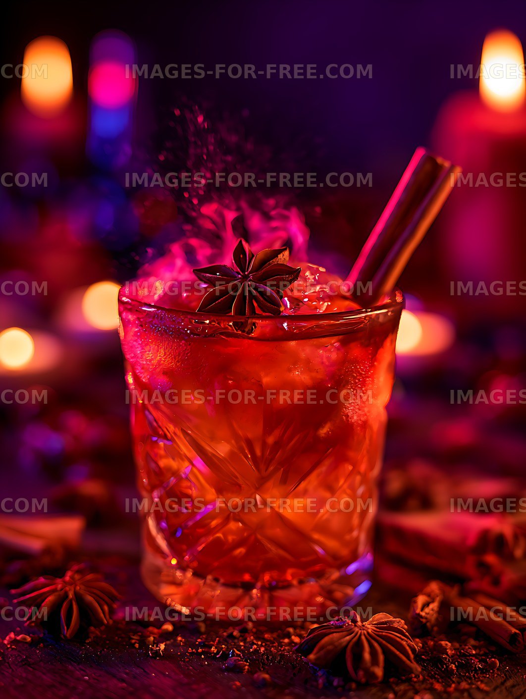 Red spiced cocktail with star anise and cinnamon