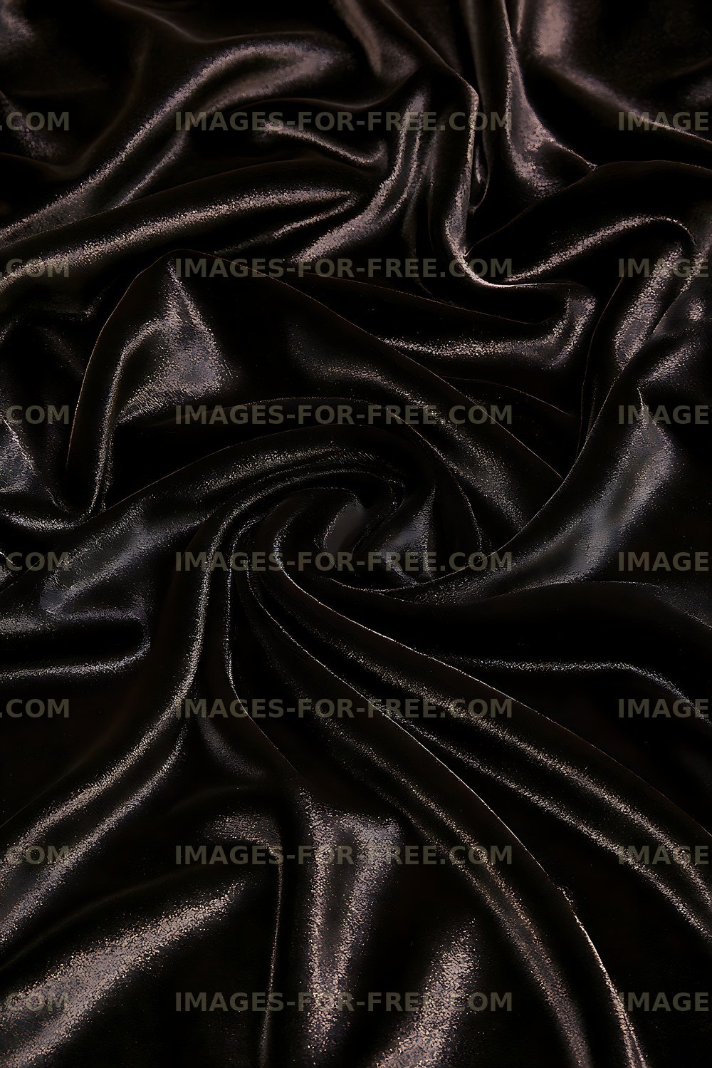 Glossy black textile with flowing folds