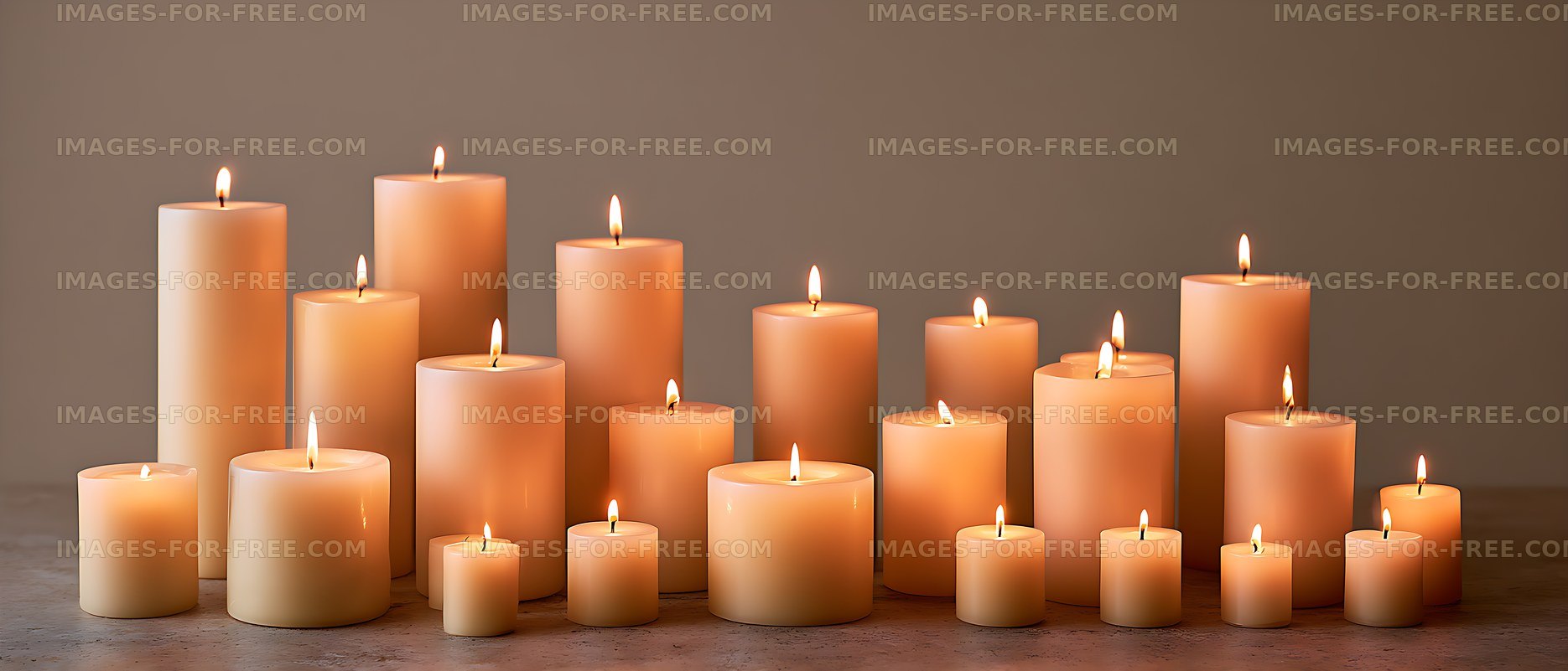 Glowing pillar candles arranged in varied heights
