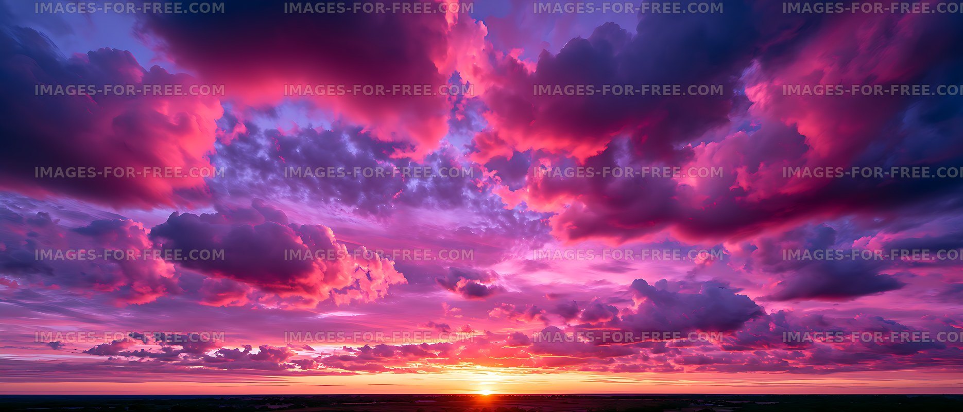 Colorful sunset cloudscape with vivid pink and purple sky