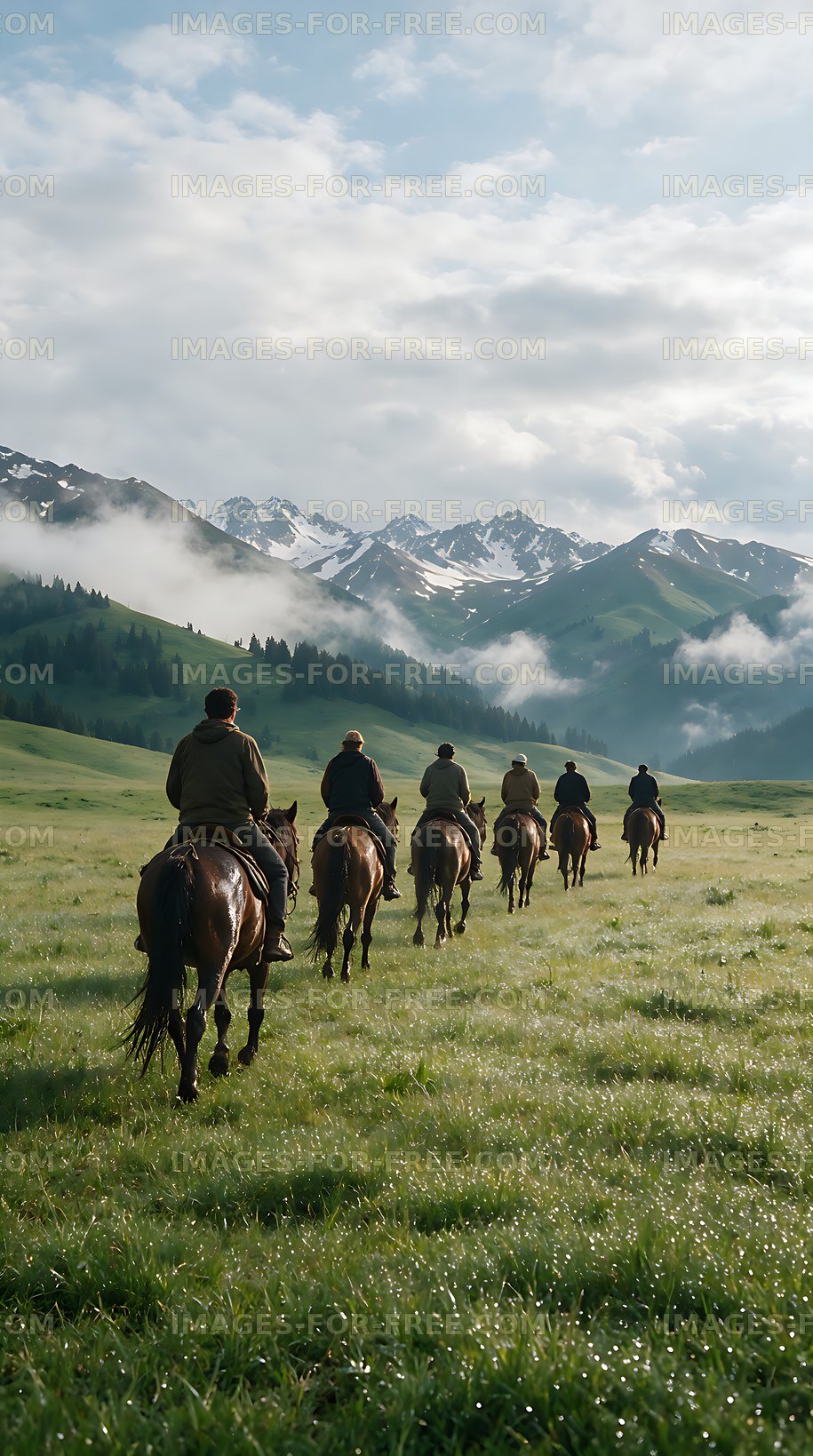 Horse riders crossing a mountain meadow