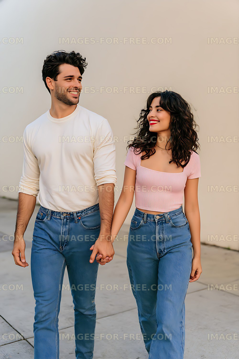 Happy couple holding hands in casual clothes