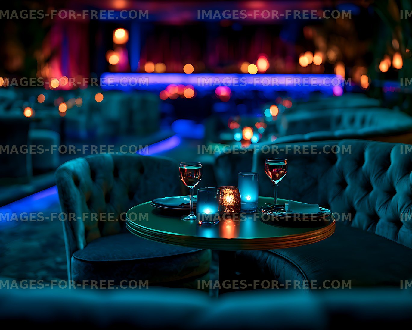 Moody nightlife lounge table with wine and candles