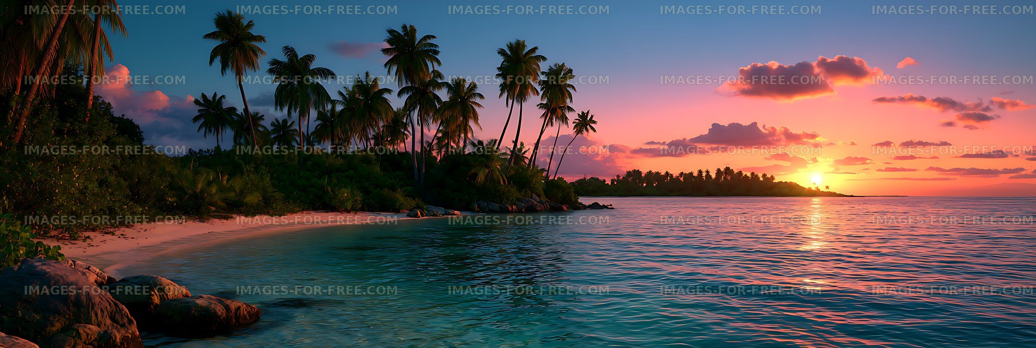 Palm-lined tropical coast during a vibrant sunset