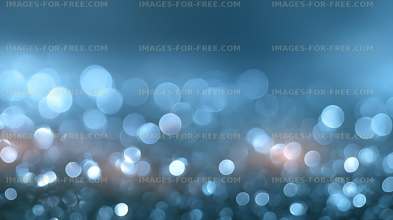 Soft blue bokeh background with glowing light circles