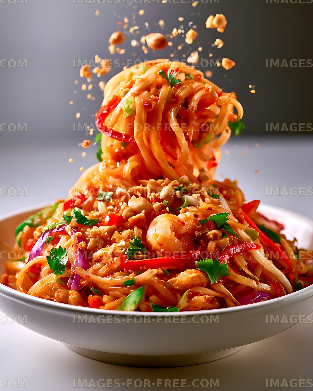 Vibrant noodle and vegetable salad in white serving bowl