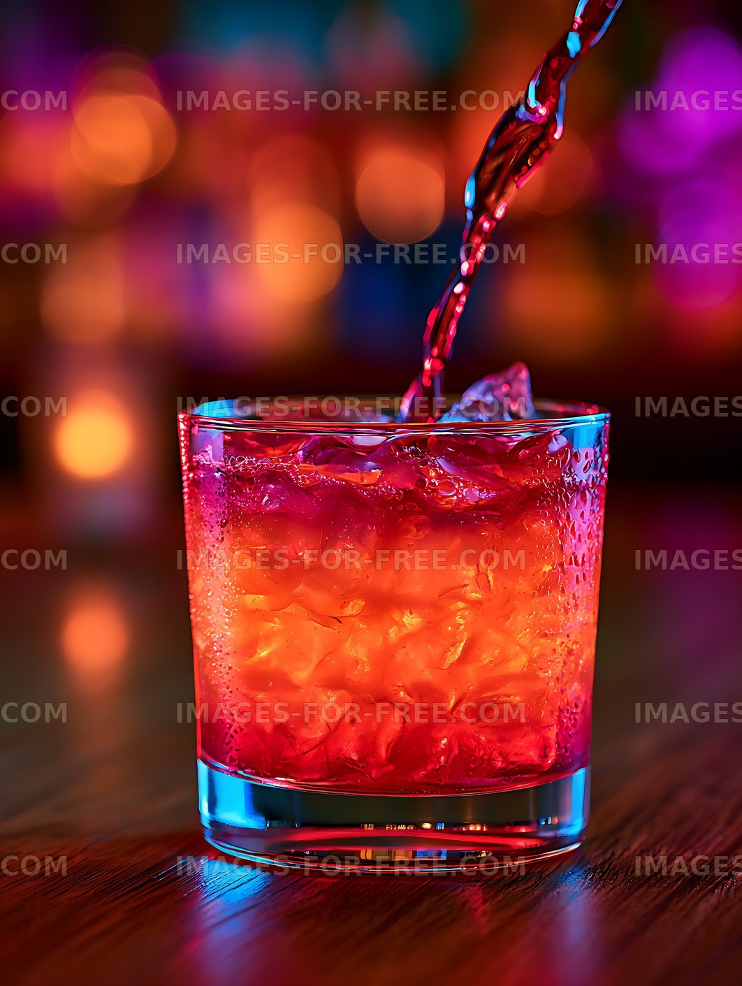 Vibrant Iced Cocktail Splash with Colorful Bokeh