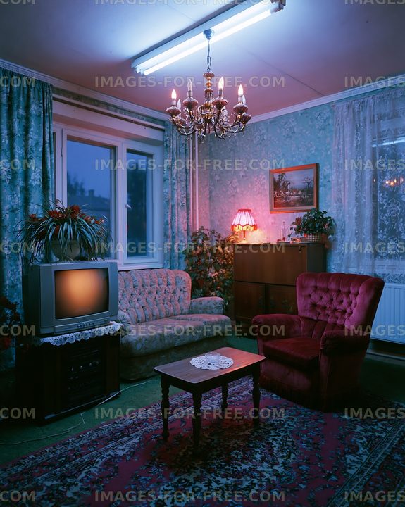 Cozy living room setup with vintage furniture and warm lighting