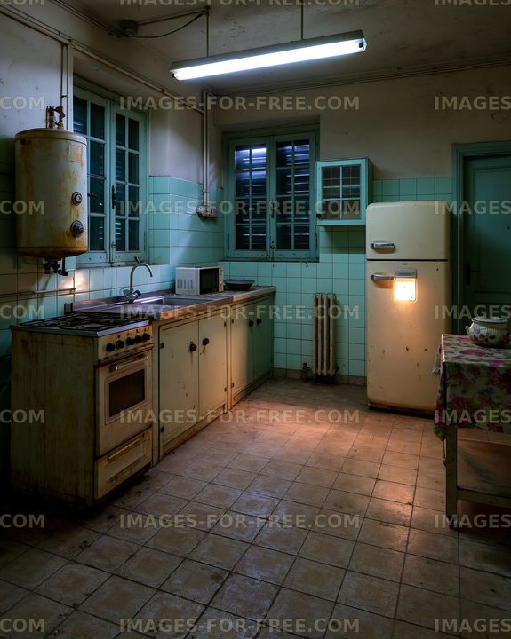 Old kitchen with vintage appliances and tiled walls