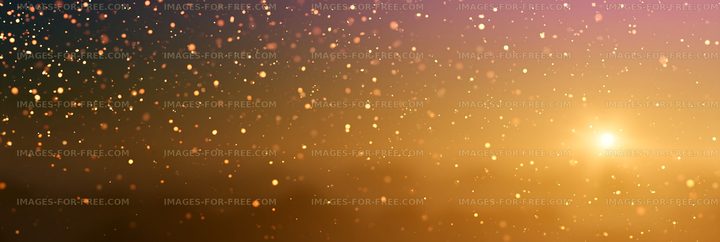 Golden bokeh lights with sunset in the background