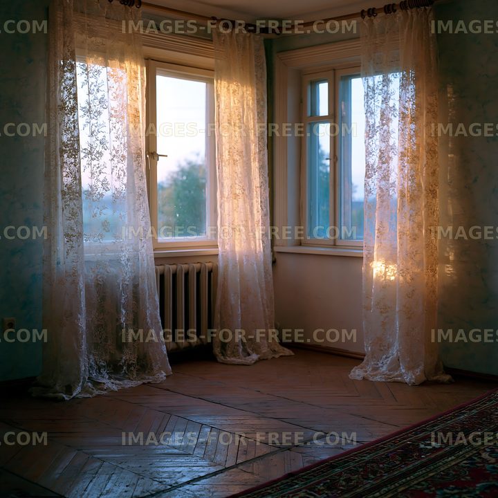 Natural light streams through lace curtains in a quiet room