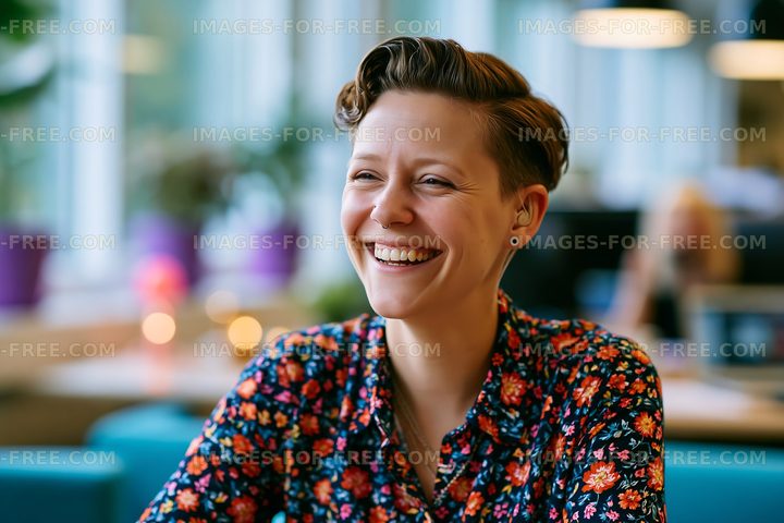 Woman smiling in a vibrant cafe setting with colorful decor