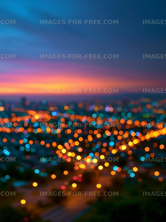 Colorful cityscape at dusk with blurred lights and sunset hues