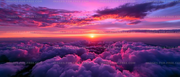 Sunset view over the clouds with vibrant colors and soft textures