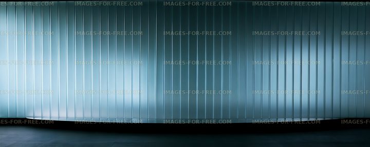 Blue vertical illuminated wall with dark floor