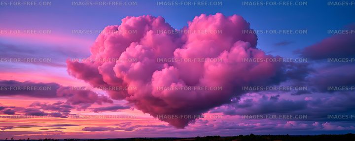 Vivid pink and purple storm clouds at sunset